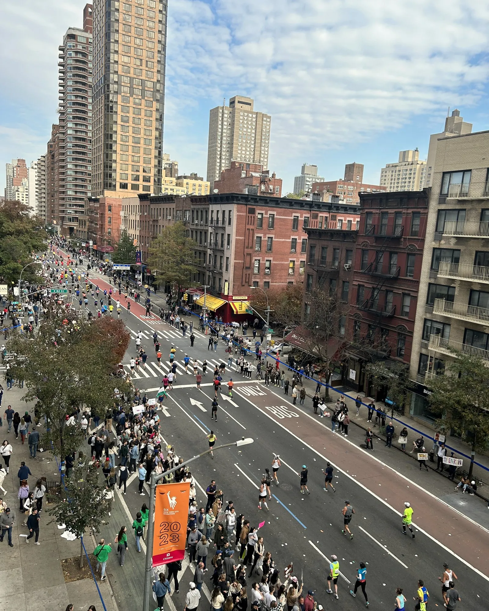 Marathon runners on First Avenue in Manhattan, seen from above